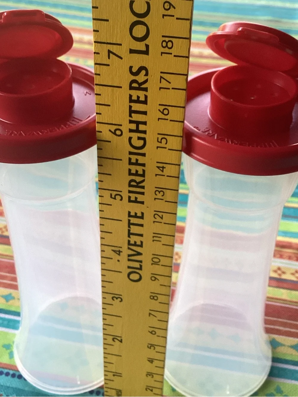 Tupperware Salt and Pepper Shakers - one set in Red